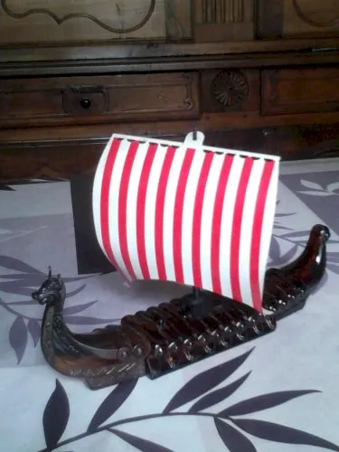 Ancienne bouteille de collection avon en forme de pirogue