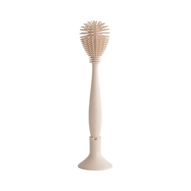 brosse à biberon en silicone mushie shifting sand